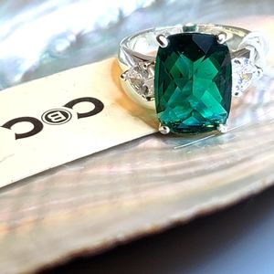 SOLD. Green Glass Rhinestone Ring by CBC. Size 8, new with tags.